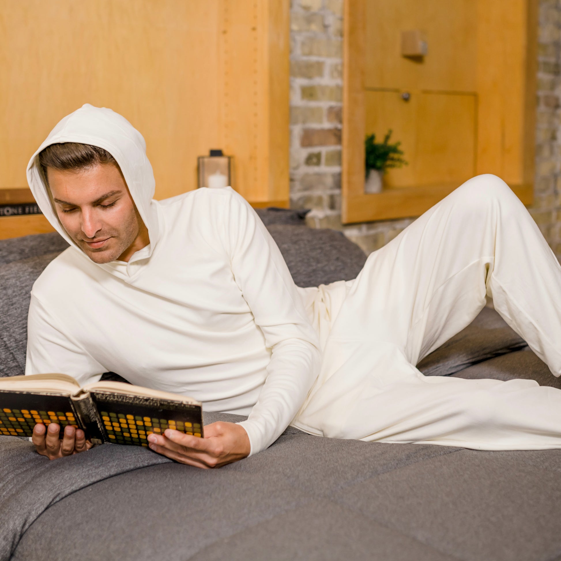 man wearing hug sleep loungewear in color cream