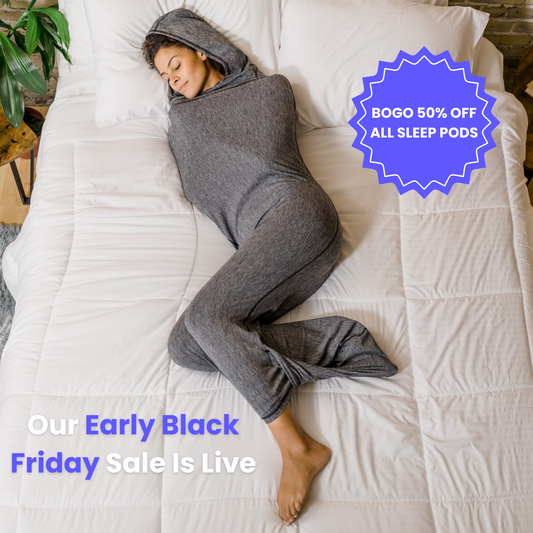 Woman in graphite color sleep pod in bed -  badge that says "BOGO 50% OFF ALL SLEEP PODS" and "OUR EARLY BLACK FRIDAY SALE IS LIVE"