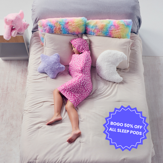 kid-in-pink-sleep-pod-mini-badge-that-says-bogo-50-off-all-sleep-pods