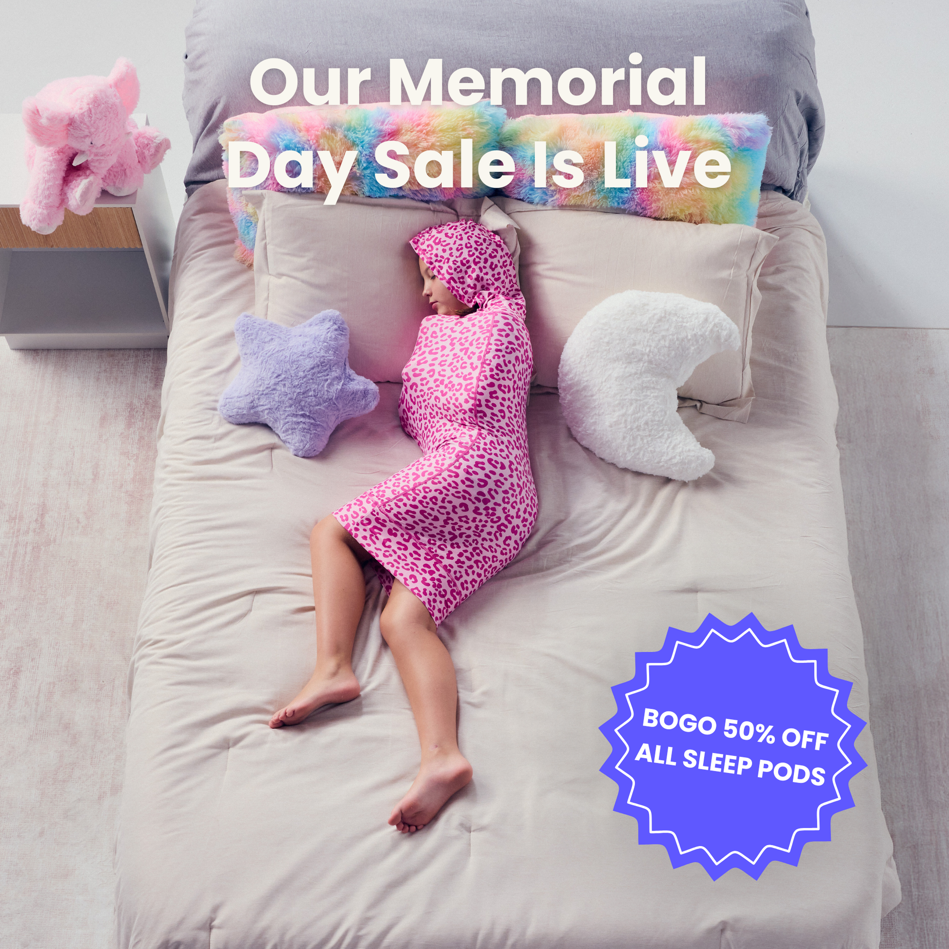 KID IN PINK SLEEP POD MINI -  badge that says "BOGO 50% OFF ALL SLEEP PODS" and "OUR MEMORIAL DAY SALE IS LIVE"