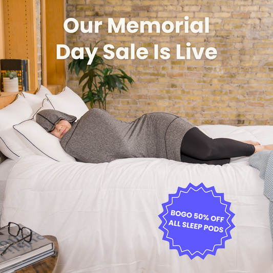 woman-in-bed-in-sleep-pod-mini-graphite-color-badge-that-says-bogo-50-off-all-sleep-pods-and-our-memorial-day-sale-is-live