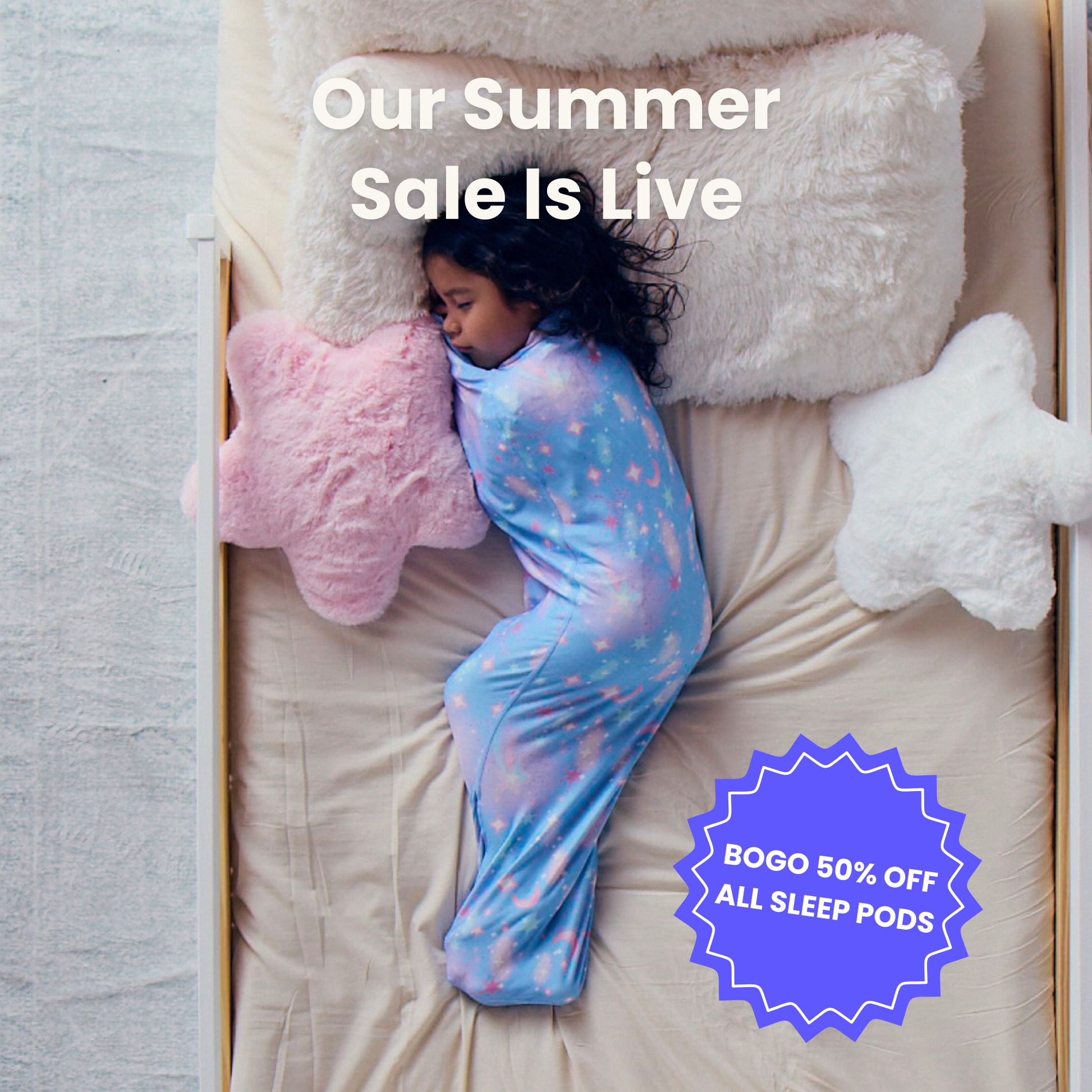 Kid in blue starry sleep pod laying in bed -  badge that says "BOGO 50% OFF ALL SLEEP PODS" and "OUR SUMMER SALE IS LIVE"