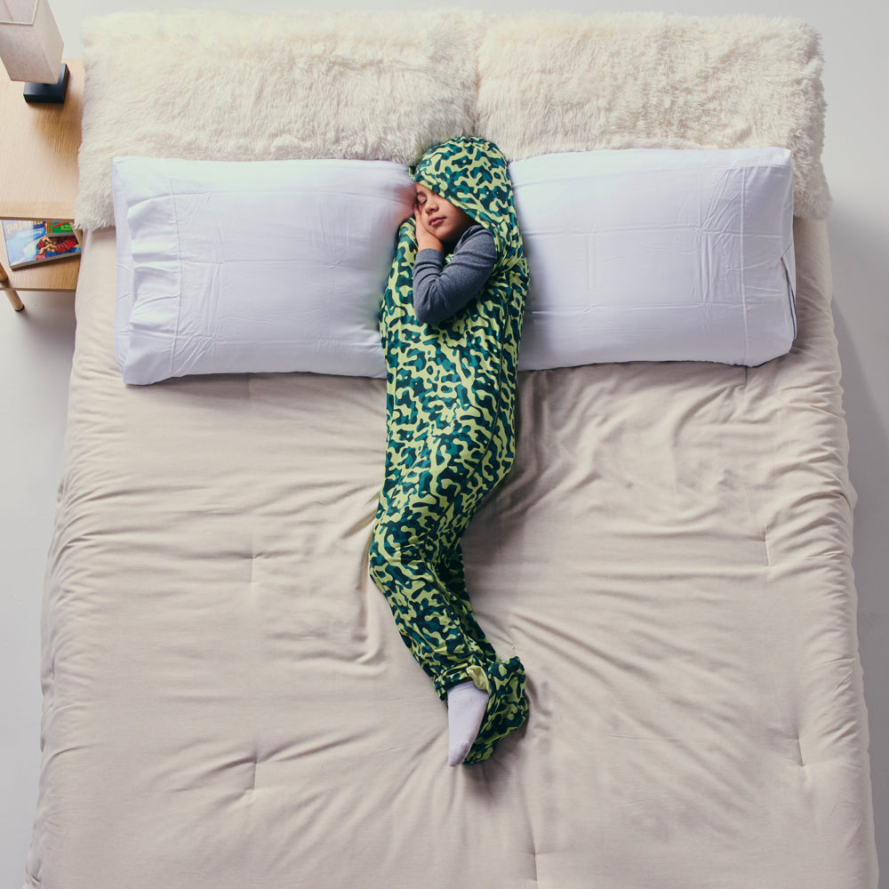 Camo#kid in sleep pod on bed