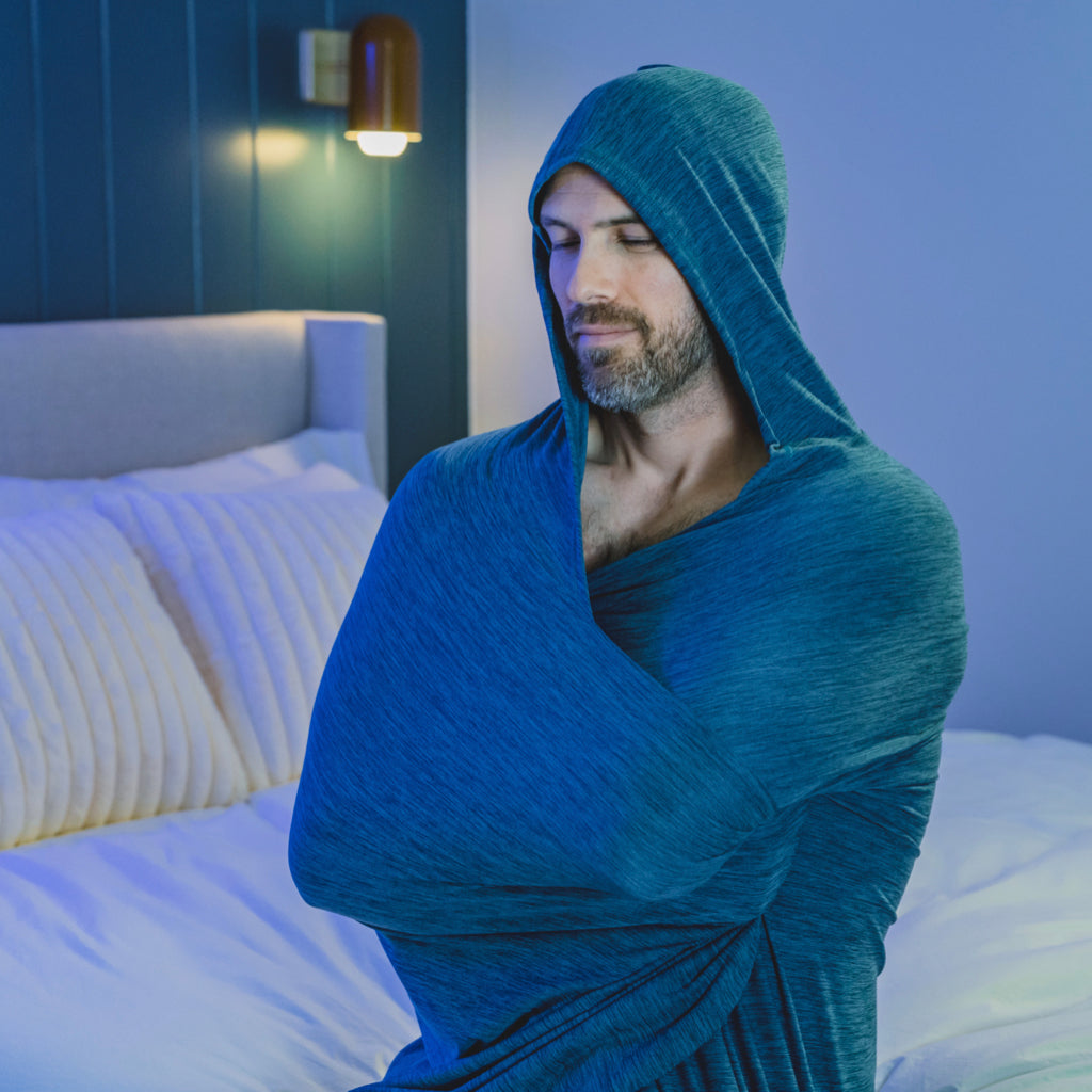 man on bed with hug wrap