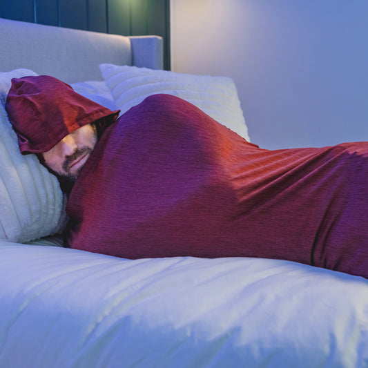 man in bed with hooded sleep pod move